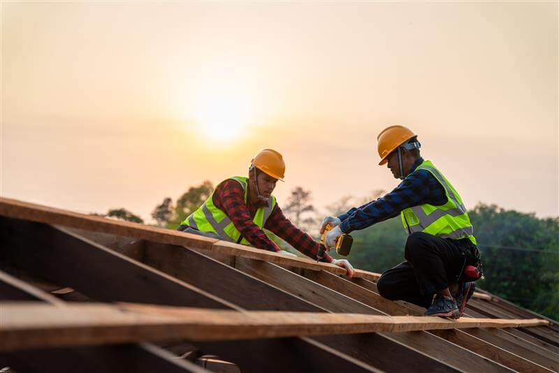 two-asian-construction-worker-install-new-roof-roofing-tools-electric-drill-used-new-roofs-wooden-roof-structure-teamwork-construction-concept